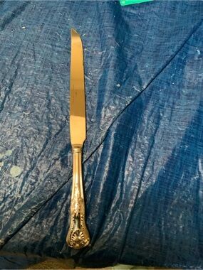 Reed & Barton Kings Stainless Korea 175th Anniversary carving knife.